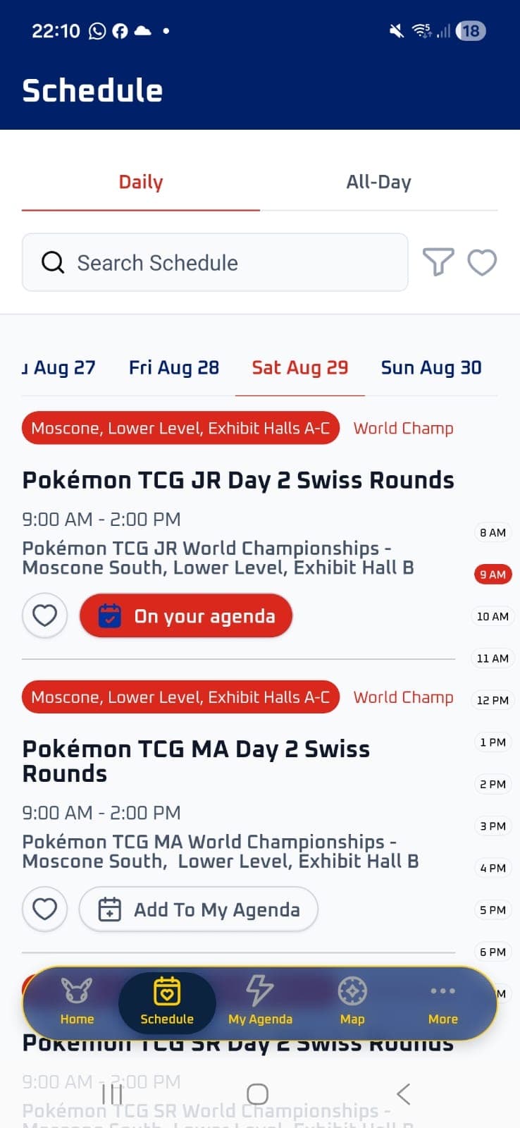 A phone showing the event app schedule listing Junior and Masters Day 2 Swiss Rounds from 9am to 2pm